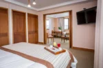 Cama de la Suite Hotel Gran Pacifico Puerto Montt