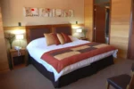 Dormitorio de la Suite del Puerto Chico Hotel Puerto Varas