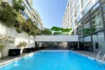 Piscina al aire libre del Hotel Wyndham Santiago Pettra Santiago